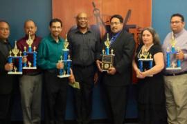 The CAPE Board of Directors present the winners of the Annual LA County Chess Tournament, sponsored by CAPE, with their award trophies on Wednesday, June 12th.