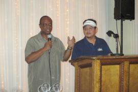 CAPE Directors Carlos Clayton and Nelson Manabat announce the Golf Tournament Winners.